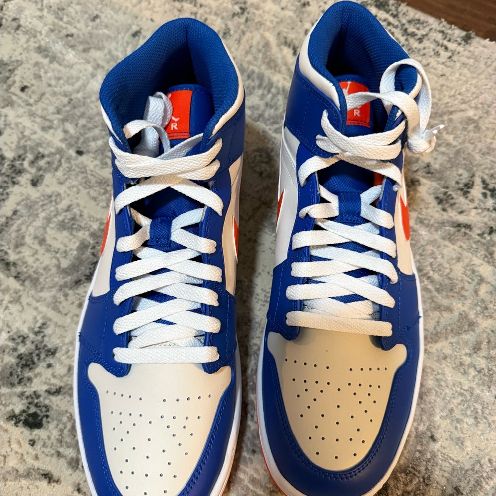 Air Jordans Blue, Orange and White High-Top Sneakers
